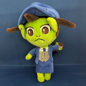 Green and Blue Plush Doll